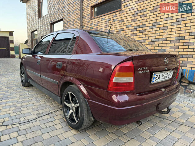 Червоний Опель Астра, об'ємом двигуна 1.4 л та пробігом 206 тис. км за 3500 $, фото 2 на Automoto.ua
