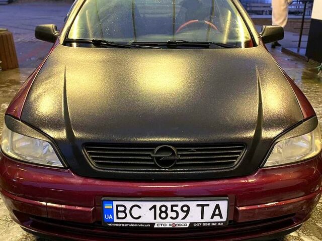 Красный Опель Астра, объемом двигателя 1.4 л и пробегом 313 тыс. км за 3800 $, фото 3 на Automoto.ua