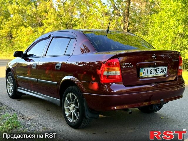Червоний Опель Астра, об'ємом двигуна 1.4 л та пробігом 180 тис. км за 4000 $, фото 3 на Automoto.ua