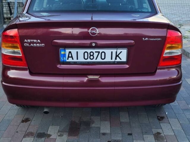 Красный Опель Астра, объемом двигателя 1.4 л и пробегом 226 тыс. км за 4500 $, фото 1 на Automoto.ua