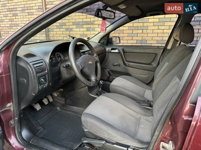 Червоний Опель Астра, об'ємом двигуна 1.4 л та пробігом 206 тис. км за 3500 $, фото 9 на Automoto.ua