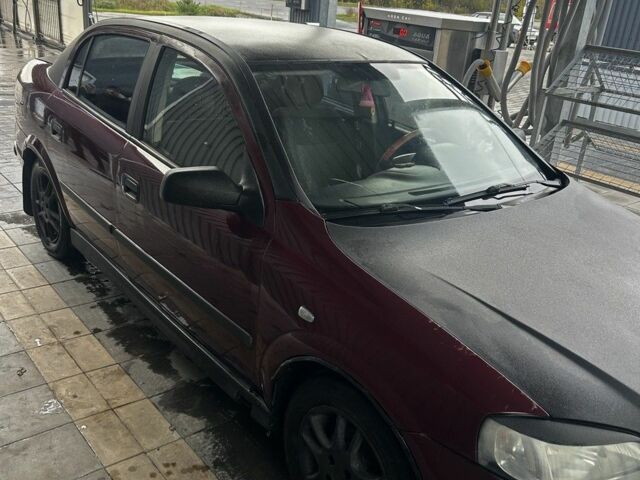 Червоний Опель Астра, об'ємом двигуна 1.4 л та пробігом 300 тис. км за 2600 $, фото 1 на Automoto.ua