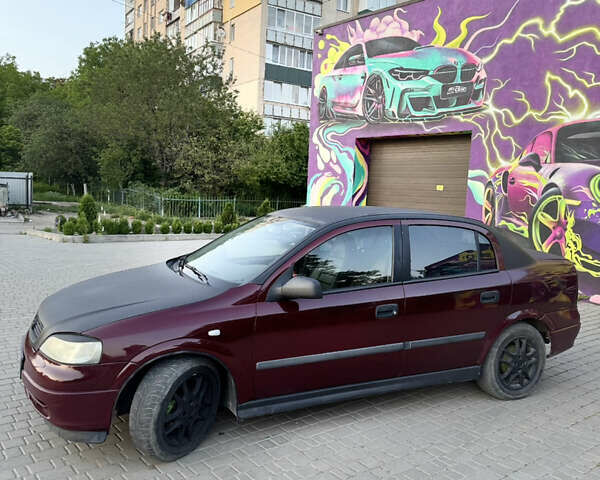 Червоний Опель Астра, об'ємом двигуна 1.4 л та пробігом 380 тис. км за 2850 $, фото 4 на Automoto.ua