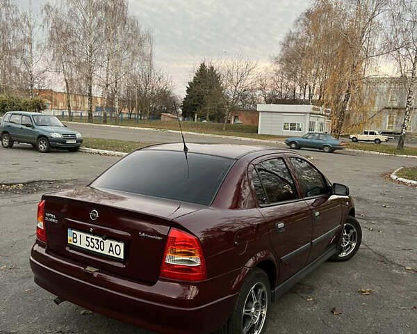 Красный Опель Астра, объемом двигателя 1.39 л и пробегом 187 тыс. км за 4800 $, фото 3 на Automoto.ua