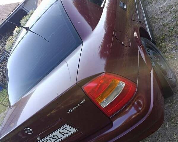 Красный Опель Астра, объемом двигателя 1.6 л и пробегом 250 тыс. км за 4700 $, фото 1 на Automoto.ua