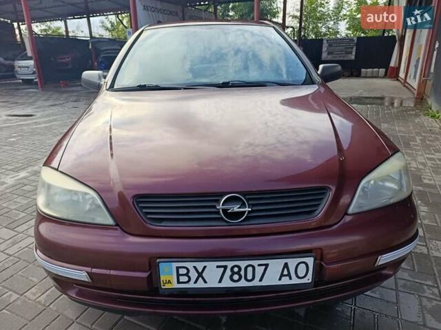 Красный Опель Астра, объемом двигателя 1.4 л и пробегом 285 тыс. км за 3100 $, фото 2 на Automoto.ua
