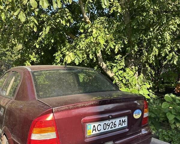 Красный Опель Астра, объемом двигателя 1.7 л и пробегом 220 тыс. км за 3000 $, фото 4 на Automoto.ua