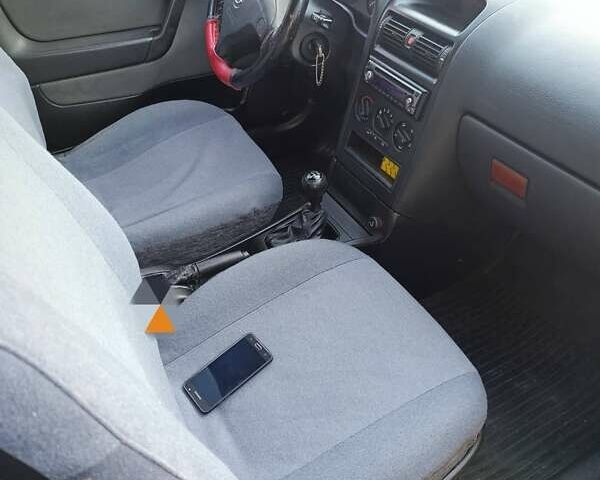 Красный Опель Астра, объемом двигателя 1.6 л и пробегом 250 тыс. км за 4700 $, фото 6 на Automoto.ua