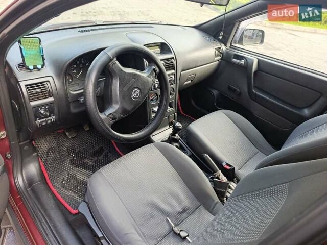 Красный Опель Астра, объемом двигателя 1.4 л и пробегом 285 тыс. км за 3100 $, фото 8 на Automoto.ua