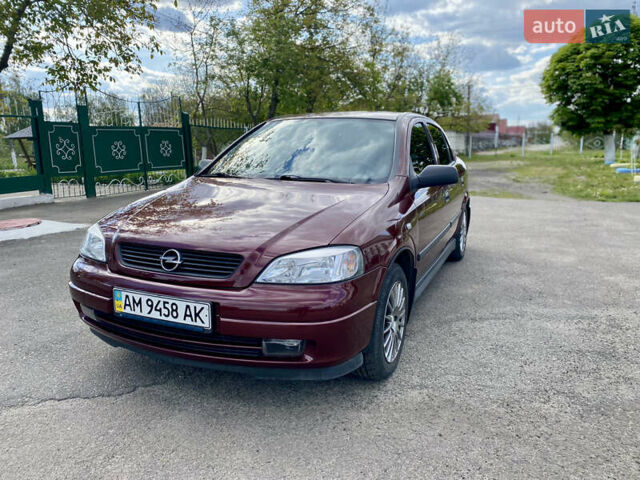 Красный Опель Астра, объемом двигателя 1.4 л и пробегом 102 тыс. км за 4750 $, фото 1 на Automoto.ua