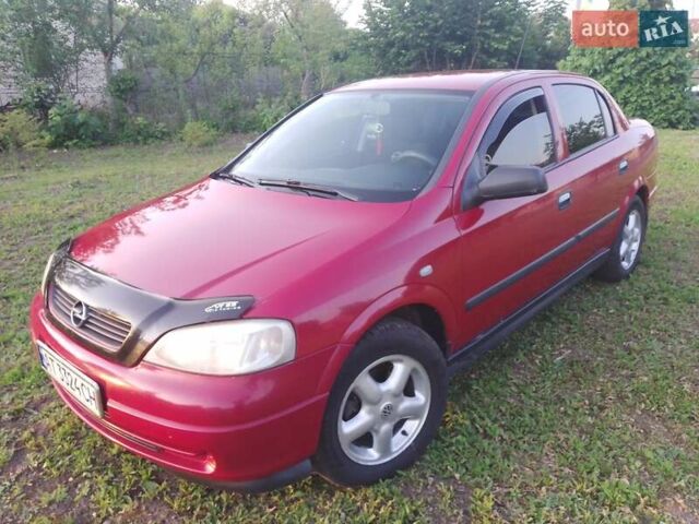 Червоний Опель Астра, об'ємом двигуна 1.6 л та пробігом 220 тис. км за 3900 $, фото 15 на Automoto.ua