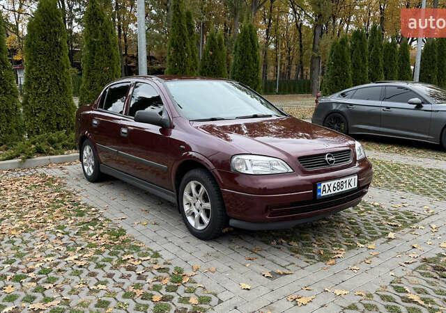 Опель Астра 2007 в Харькове на Automoto.ua Красный Опель Астра, объемом двигателя 1.36 л и пробегом 87 тыс. км за 4200 $, фото 9 на Automoto.ua