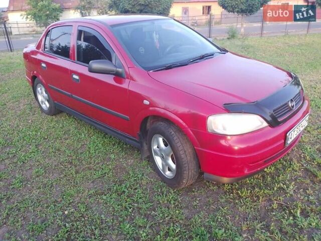 Червоний Опель Астра, об'ємом двигуна 1.6 л та пробігом 220 тис. км за 3900 $, фото 5 на Automoto.ua