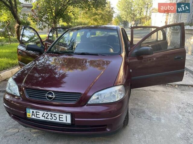 Красный Опель Астра, объемом двигателя 1.4 л и пробегом 177 тыс. км за 4600 $, фото 11 на Automoto.ua