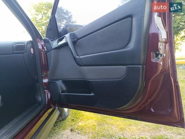 Красный Опель Астра, объемом двигателя 1.6 л и пробегом 250 тыс. км за 4700 $, фото 3 на Automoto.ua