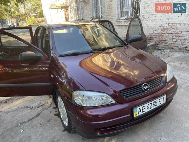 Красный Опель Астра, объемом двигателя 1.4 л и пробегом 177 тыс. км за 4600 $, фото 12 на Automoto.ua