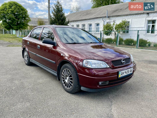 Красный Опель Астра, объемом двигателя 1.4 л и пробегом 102 тыс. км за 4750 $, фото 3 на Automoto.ua