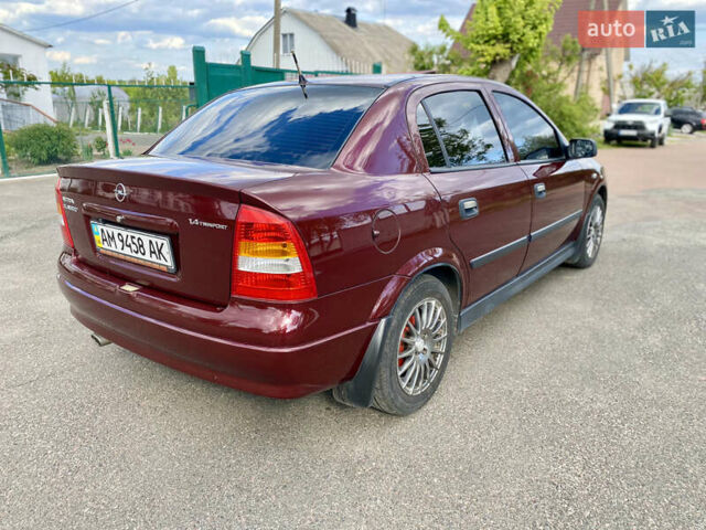 Красный Опель Астра, объемом двигателя 1.4 л и пробегом 102 тыс. км за 4750 $, фото 5 на Automoto.ua