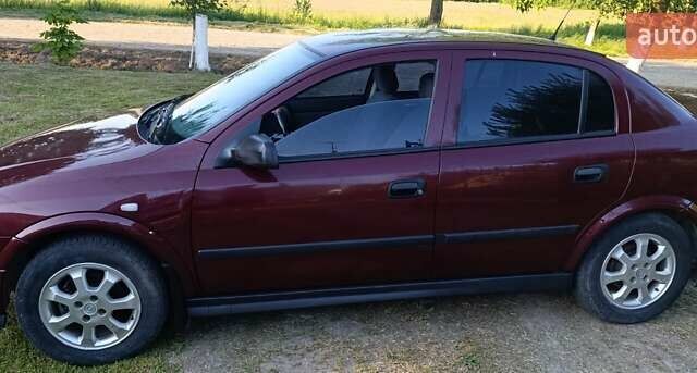Красный Опель Астра, объемом двигателя 1.6 л и пробегом 250 тыс. км за 4700 $, фото 5 на Automoto.ua