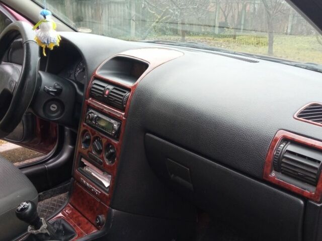 Красный Опель Астра, объемом двигателя 1.4 л и пробегом 160 тыс. км за 3500 $, фото 19 на Automoto.ua