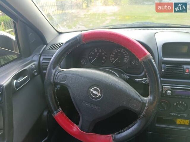 Красный Опель Астра, объемом двигателя 1.6 л и пробегом 250 тыс. км за 4700 $, фото 4 на Automoto.ua