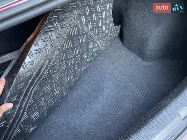 Красный Опель Астра, объемом двигателя 1.4 л и пробегом 177 тыс. км за 4600 $, фото 30 на Automoto.ua