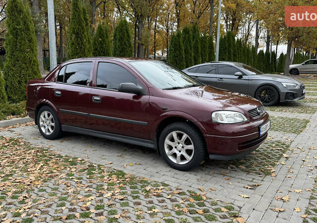 Опель Астра 2007 в Харькове на Automoto.ua Красный Опель Астра, объемом двигателя 1.36 л и пробегом 87 тыс. км за 4200 $, фото 10 на Automoto.ua