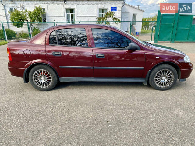 Красный Опель Астра, объемом двигателя 1.4 л и пробегом 102 тыс. км за 4750 $, фото 4 на Automoto.ua