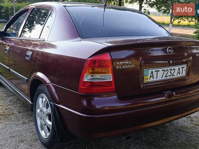 Красный Опель Астра, объемом двигателя 1.6 л и пробегом 250 тыс. км за 4700 $, фото 11 на Automoto.ua