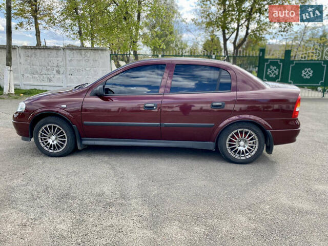 Красный Опель Астра, объемом двигателя 1.4 л и пробегом 102 тыс. км за 4750 $, фото 8 на Automoto.ua
