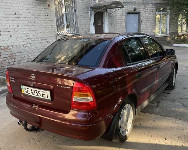 Красный Опель Астра, объемом двигателя 1.4 л и пробегом 177 тыс. км за 4600 $, фото 8 на Automoto.ua