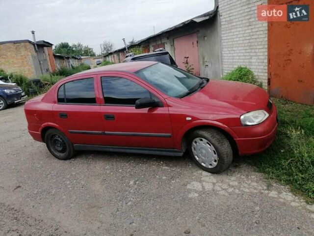 Красный Опель Астра, объемом двигателя 1.6 л и пробегом 150 тыс. км за 4000 $, фото 5 на Automoto.ua