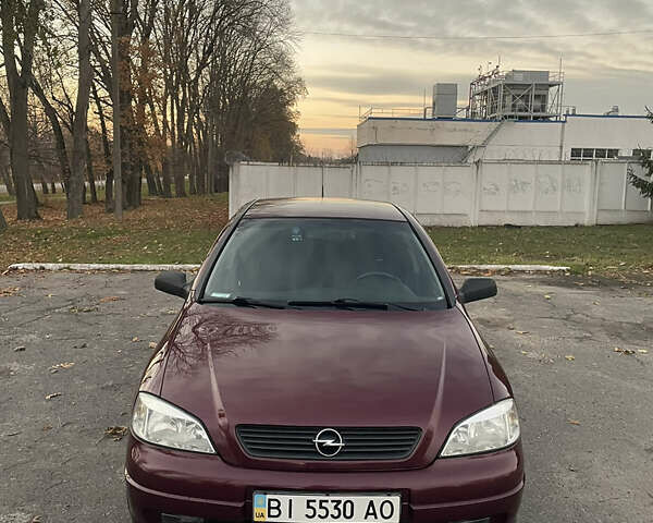 Красный Опель Астра, объемом двигателя 1.39 л и пробегом 187 тыс. км за 4800 $, фото 1 на Automoto.ua