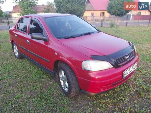 Червоний Опель Астра, об'ємом двигуна 1.6 л та пробігом 220 тис. км за 3900 $, фото 4 на Automoto.ua