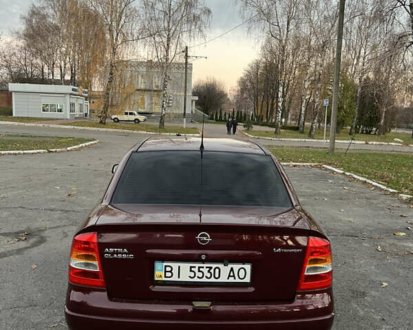 Красный Опель Астра, объемом двигателя 1.39 л и пробегом 187 тыс. км за 4800 $, фото 4 на Automoto.ua
