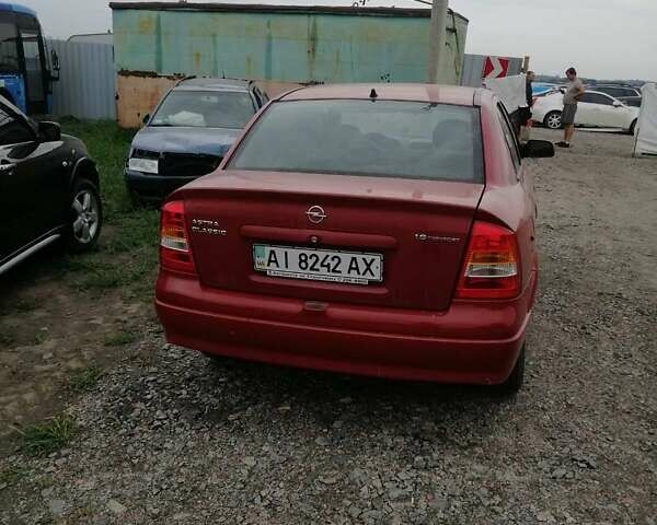Красный Опель Астра, объемом двигателя 1.6 л и пробегом 150 тыс. км за 4000 $, фото 1 на Automoto.ua