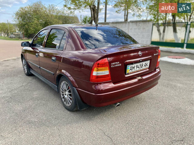 Красный Опель Астра, объемом двигателя 1.4 л и пробегом 102 тыс. км за 4750 $, фото 7 на Automoto.ua