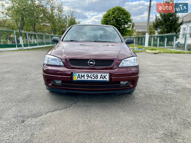 Красный Опель Астра, объемом двигателя 1.4 л и пробегом 102 тыс. км за 4750 $, фото 2 на Automoto.ua