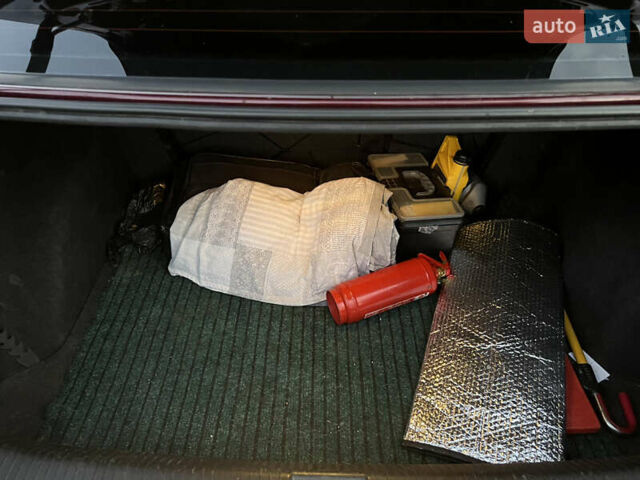 Красный Опель Астра, объемом двигателя 1.39 л и пробегом 187 тыс. км за 4800 $, фото 9 на Automoto.ua