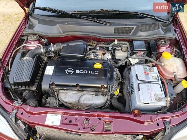 Красный Опель Астра, объемом двигателя 1.6 л и пробегом 250 тыс. км за 4700 $, фото 7 на Automoto.ua
