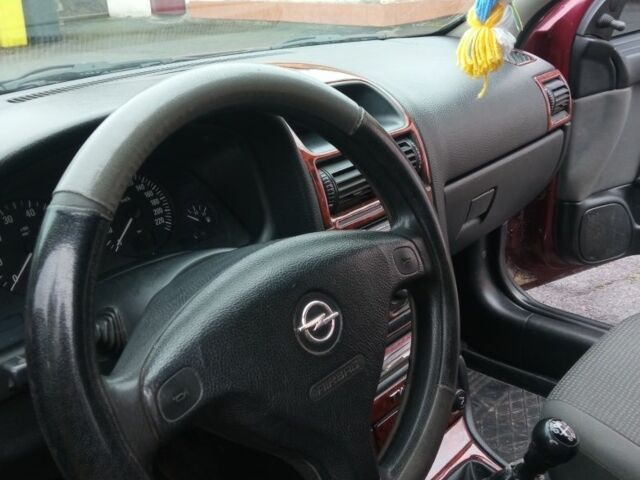 Красный Опель Астра, объемом двигателя 1.4 л и пробегом 160 тыс. км за 3500 $, фото 18 на Automoto.ua