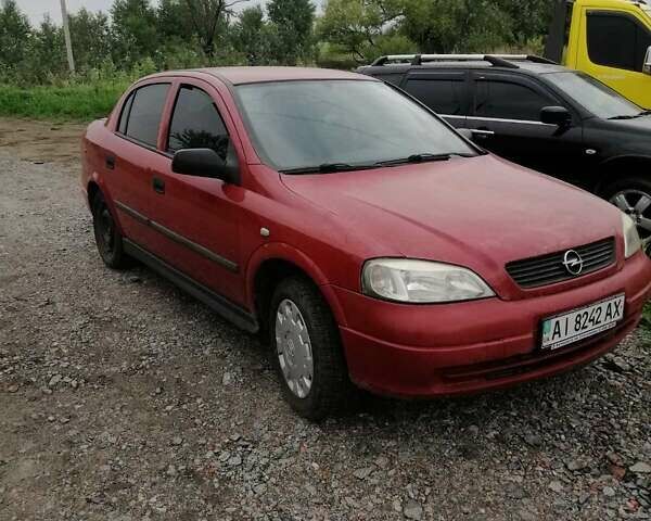 Красный Опель Астра, объемом двигателя 1.6 л и пробегом 150 тыс. км за 4000 $, фото 2 на Automoto.ua