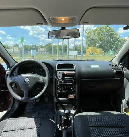 Опель Астра 2007 в Харькове на Automoto.ua Красный Опель Астра, объемом двигателя 1.36 л и пробегом 87 тыс. км за 4200 $, фото 11 на Automoto.ua