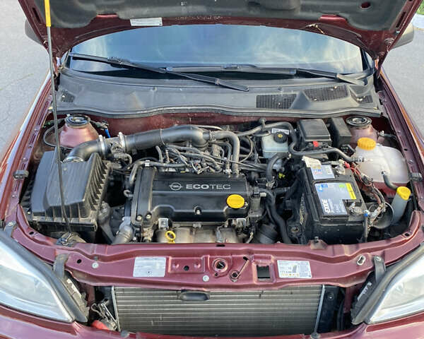 Красный Опель Астра, объемом двигателя 1.36 л и пробегом 173 тыс. км за 4800 $, фото 8 на Automoto.ua