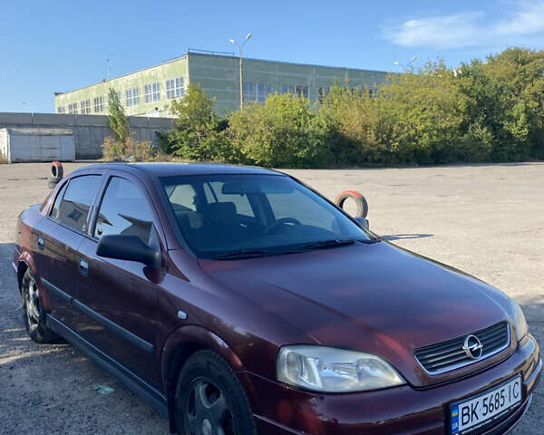 Красный Опель Астра, объемом двигателя 1.6 л и пробегом 233 тыс. км за 3300 $, фото 2 на Automoto.ua