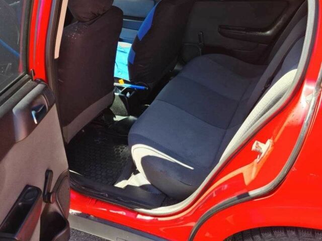 Красный Опель Астра, объемом двигателя 1.4 л и пробегом 3 тыс. км за 3400 $, фото 14 на Automoto.ua