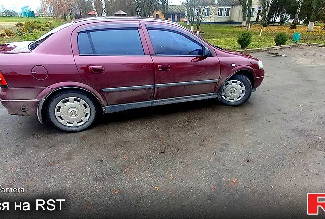 Красный Опель Астра, объемом двигателя 1.4 л и пробегом 100 тыс. км за 3100 $, фото 2 на Automoto.ua
