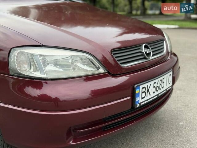 Червоний Опель Астра, об'ємом двигуна 1.6 л та пробігом 233 тис. км за 3400 $, фото 13 на Automoto.ua