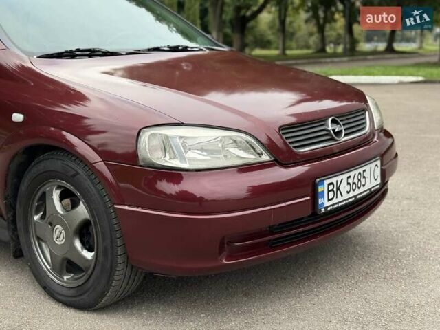 Червоний Опель Астра, об'ємом двигуна 1.6 л та пробігом 233 тис. км за 3400 $, фото 12 на Automoto.ua