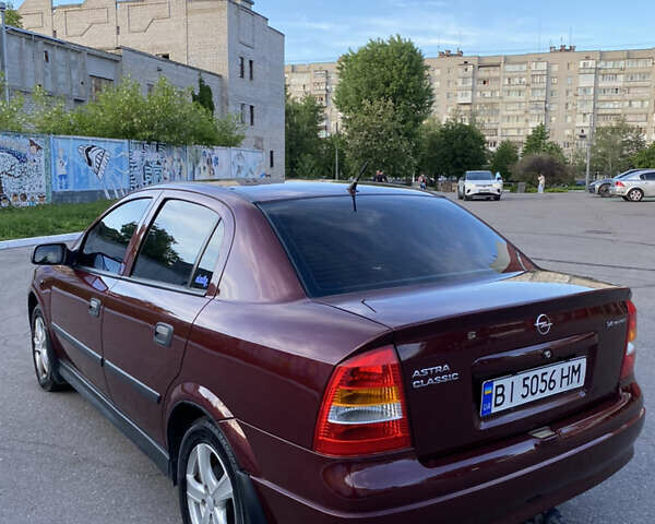 Красный Опель Астра, объемом двигателя 1.36 л и пробегом 173 тыс. км за 4800 $, фото 3 на Automoto.ua